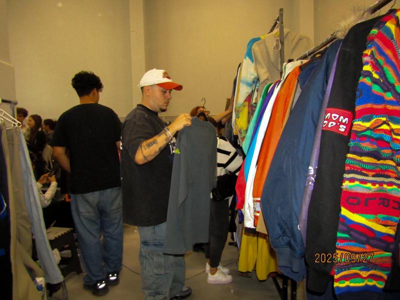 A vendor chatting with customers